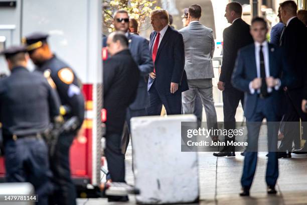 Former U.S. President Donald Trump departs Trump Tower as he heads to an arraignment hearing on April 04, 2023 in New York City.Trump will be...