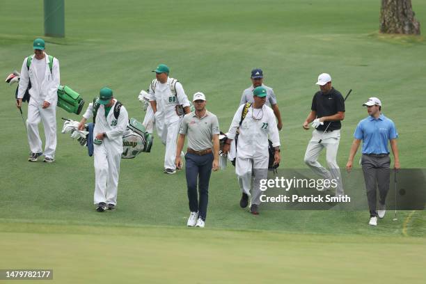 Sam Burns of the United States, Xander Schauffele of the United States, Scottie Scheffler of the United States and Patrick Cantlay of the United...