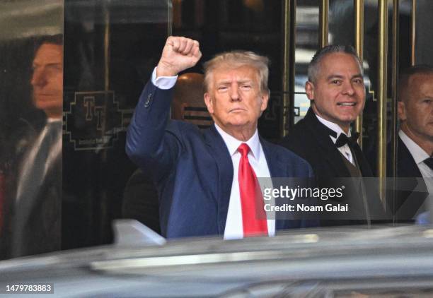 Former US President Donald Trump exits Trump Tower to attend court for his arraignment on April 04, 2023 in New York City.