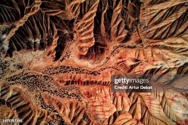 majestic aerial view of the desert badlands of the bardenas reales in spain with amazing eroded rugged sandstone formations. - rock strata imagens e fotografias de stock