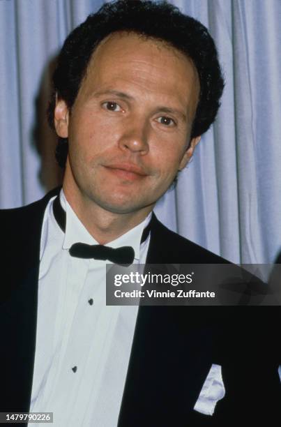 Billy Crystal attends the Annual Academy Awards, United States, circa 1990s.