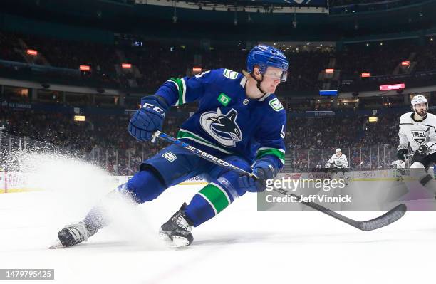 Jack Rathbone of the Vancouver Canucks skates up ice during their NHL game against the Los Angeles Kings at Rogers Arena April 2, 2023 in Vancouver,...
