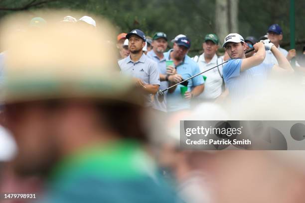 Patrick Cantlay of the United States plays his shot from the 18th tee during a practice round prior to the 2023 Masters Tournament at Augusta...