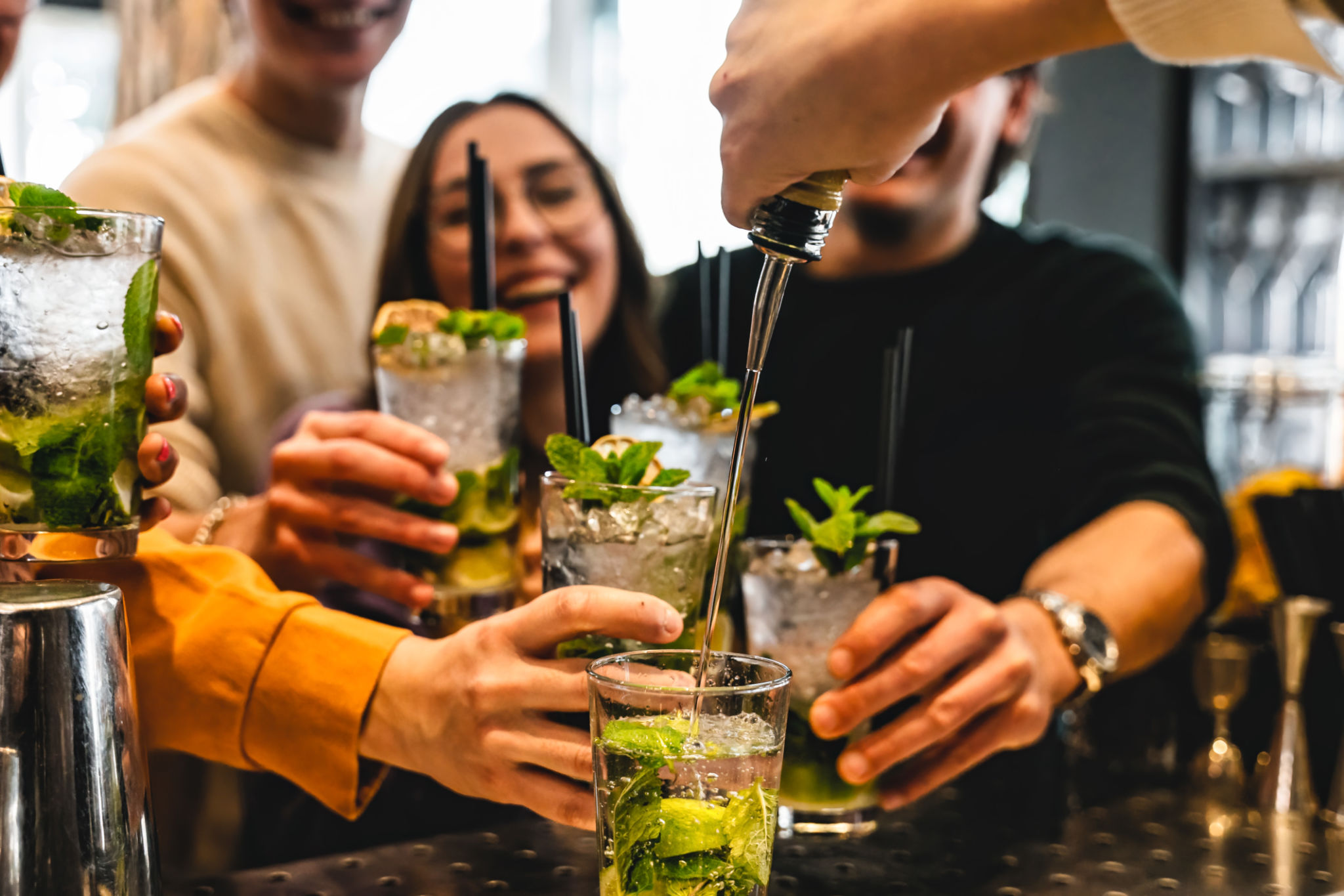 people making cocktails
