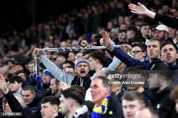 Leeds United fan shows their support from the stands prior to the Premier League match between Leeds United and Nottingham Forest at Elland Road on...