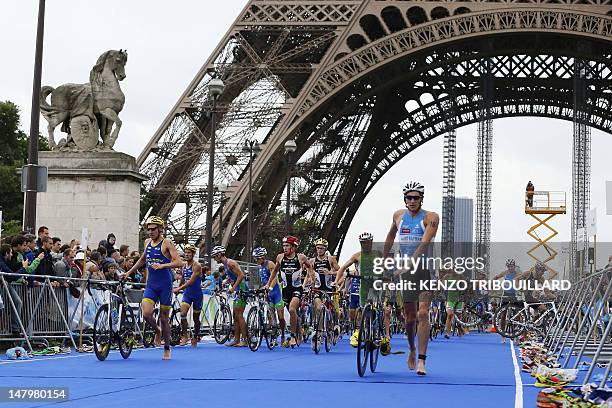 French athlete Raoul Shaw competes during the 6th edition of the Paris triathlon on July 7, 2012 in Paris. The participants swam a distance of 0.5...