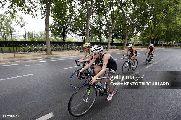 French athlete Marine Echevin competes during the 6th edition of the Paris triathlon on July 7, 2012 in Paris. The participants swam a distance of...