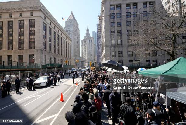 Members of the media gather outside the Manhattan Criminal Courthouse during an arraignment hearing for former U.S. President Donald Trump on April...