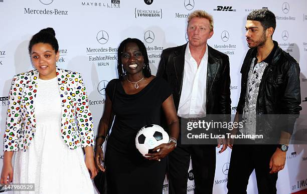 Akini Obama, Auma Obama, Boris Becker and Noah Becker arrive for the Minx By Eva Lux Show at Mercedes-Benz Fashion Week Spring/Summer 2013 on July 7,...