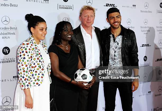 Akini Obama, Auma Obama, Boris Becker and Noah Becker arrive for the Minx By Eva Lux Show at Mercedes-Benz Fashion Week Spring/Summer 2013 on July 7,...