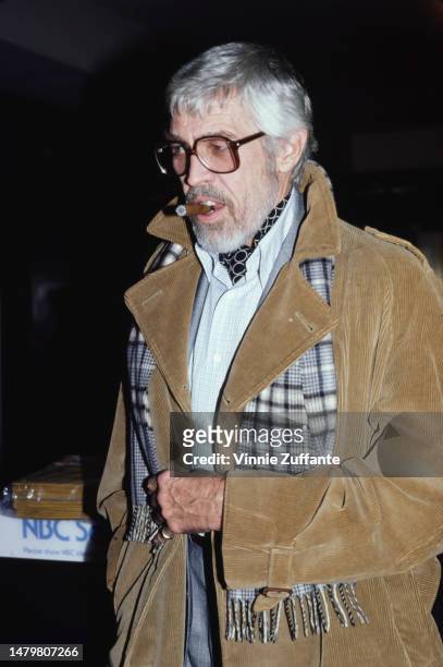 James Coburn attends an event, United States, 4th February 1982.