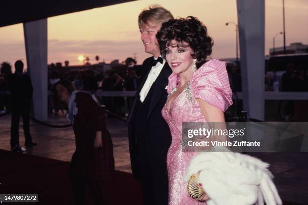 Joan Collins and Peter Holm attend the 11th Annual People's Choice Awards After Party at Ma Maison Restaurant in West Hollywood, California, United...