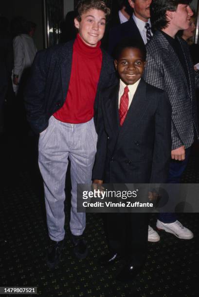 Gary Coleman and an identified person attend an event, United States, circa 1990s.
