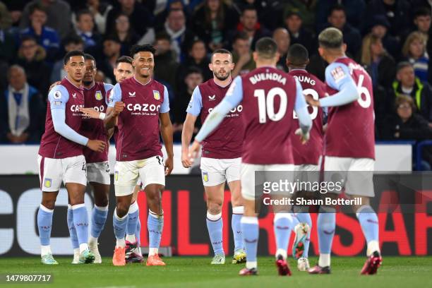 Ollie Watkins of Aston Villa celebrates with teammates after scoring the team's first goal during the Premier League match between Leicester City and...