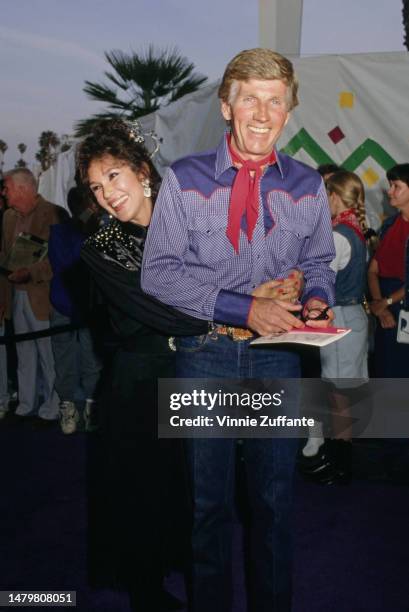 Gary Collins and wife Mary Ann Mobley attending 37th Annual Share Boomtown Party at the Santa Monica Civic Auditorium in Santa Monica, California,...