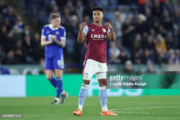 Ollie Watkins of Aston Villa celebrates after scoring the team's first goal during the Premier League match between Leicester City and Aston Villa at...