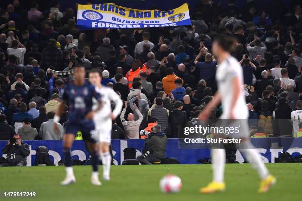 Leeds United fans hold up a banner and turn their backs to the pitch during the Premier League match between Leeds United and Nottingham Forest at...