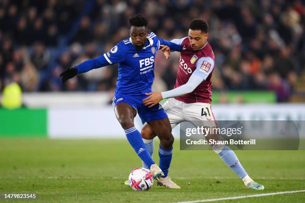 Wilfred Ndidi of Leicester City is challenged by Jacob Ramsey of Aston Villa during the Premier League match between Leicester City and Aston Villa...