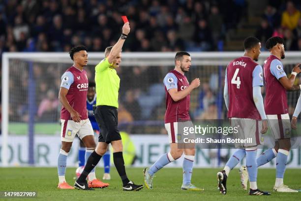 Referee Graham Scott shows Kiernan Dewsbury-Hall of Leicester City a red card during the Premier League match between Leicester City and Aston Villa...