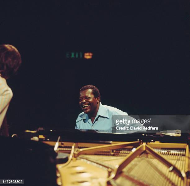 Canadian jazz pianist Oscar Peterson performs live on stage, circa 1975. (photo by David Redfern/Redferns