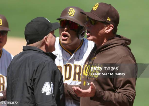 Head coach Bob Melvin argues with umpire Ron Kulpa after Manny Machado of the San Diego Padres was called out on a timed third strike during the...
