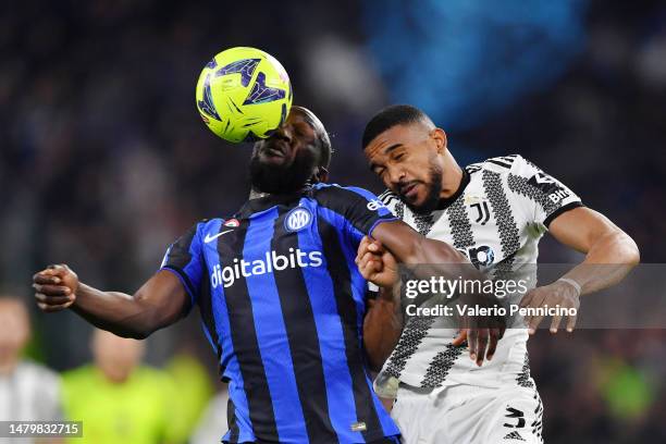 Romelu Lukaku of FC Internazionale battles for a header with Bremer of Juventus during the Coppa Italia Semi Final match between Juventus FC and FC...