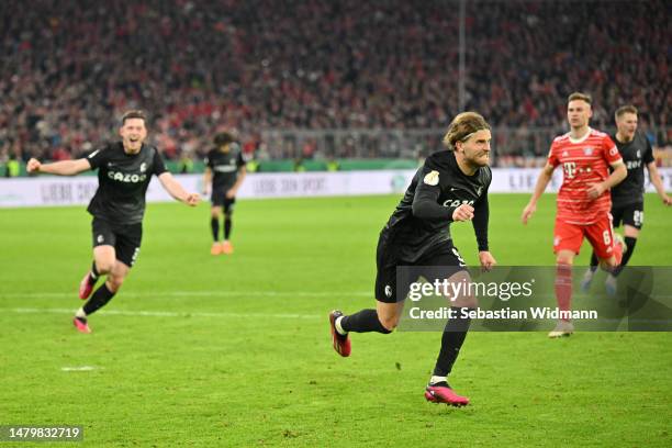 Lucas Hoeler of Sport-Club Freiburg celebrates after scoring the team's second goal from a penalty kick during the DFB Cup quarterfinal match between...