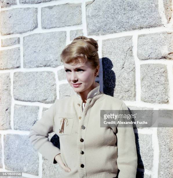 Actress Debbie Reynolds lays against a wall while filming ‘It Started With A Kiss’ in 1958 in Madrid, Spain.