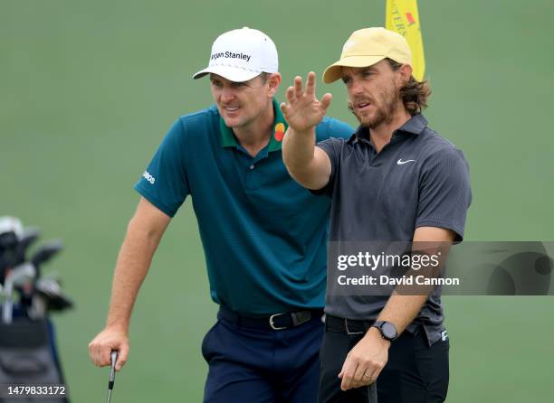 Justin Rose of England and Tommy Fleetwood of England on the second hole during practice prior to the 2023 Masters Tournament at Augusta National...