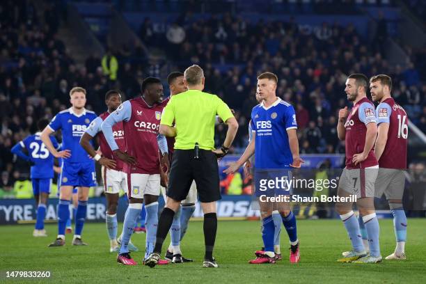Harvey Barnes of Leicester City reacts towards Referee Graham Scott after appealing during the Premier League match between Leicester City and Aston...