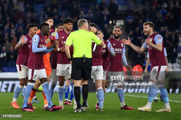 Calum Chambers of Aston Villa appeals to Referee Graham Scott during the Premier League match between Leicester City and Aston Villa at The King...