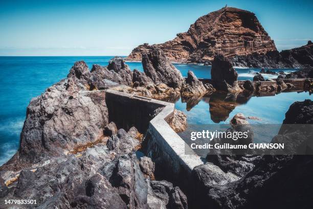 porto moniz natural pool, madeira. - lava stock pictures, royalty-free photos & images