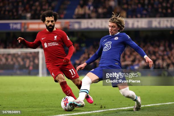 Conor Gallagher of Chelsea battles for possession with Mohamed Salah of Liverpool during the Premier League match between Chelsea FC and Liverpool FC...