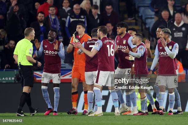 Bertrand Traore , Emiliano Martinez of Aston Villa appeal with teammates against a penalty towards Referee Graham Scott during the Premier League...