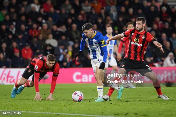 Julio Enciso of Brighton & Hove Albion runs with the ball past Jack Stephens of AFC Bournemouth during the Premier League match between AFC...