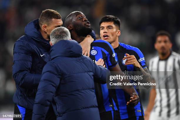 Romelu Lukaku of FC Internazionale celebrates with teammates after scoring the team's first goal during the Coppa Italia Semi Final match between...