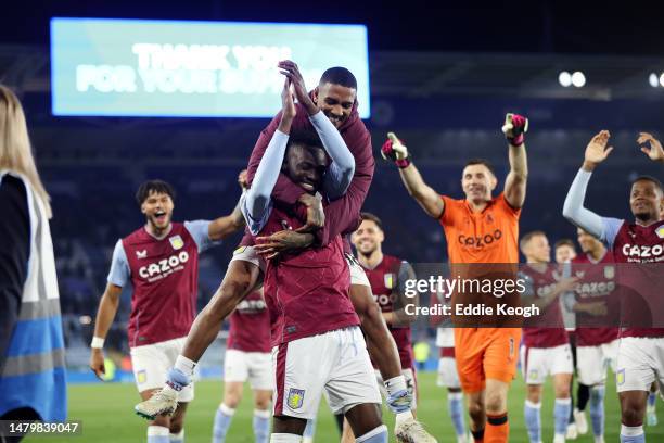 Bertrand Traore of Aston Villa celebrates with teammates after the team's victory in the Premier League match between Leicester City and Aston Villa...