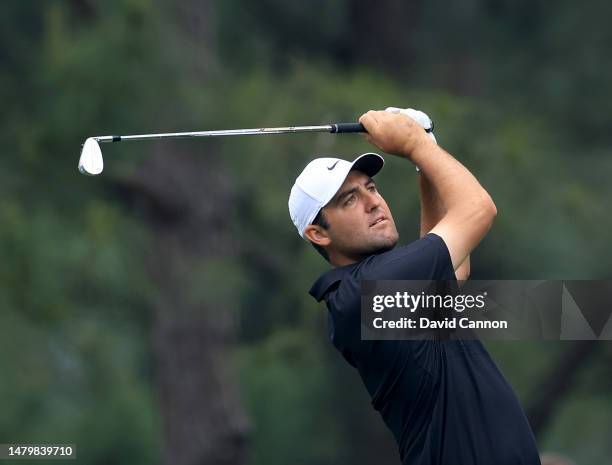 Scottie Scheffler of The United States plays his second shot on the 14th hole during practice prior to the 2023 Masters Tournament at Augusta...