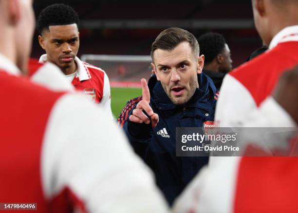 Jack Wilshere the Arsenal U18 Head Coach talks to his players before the extra time during the FA Youth Cup semi final between Arsenal U18 and...