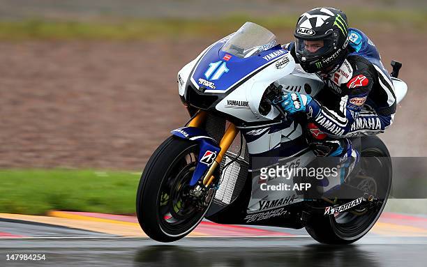 Second-place finisher Ben Spies of Yamaha Factory Racing team steers his bike during the qualifying session of the MotoGP of Germany at the...