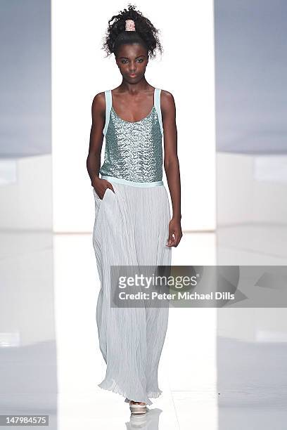 Model walks the runway at the Michalsky Style Nite fashion show on July 6, 2012 in Berlin, Germany.