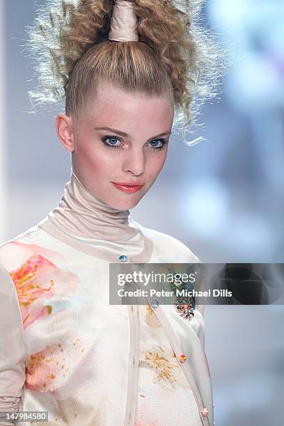 Model walks the runway at the Michalsky Style Nite fashion show on July 6, 2012 in Berlin, Germany.