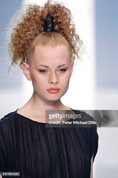 Model walks the runway at the Michalsky Style Nite fashion show on July 6, 2012 in Berlin, Germany.