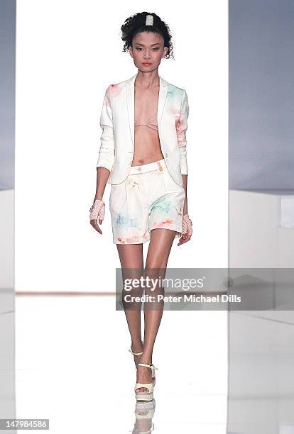 Model walks the runway at the Michalsky Style Nite fashion show on July 6, 2012 in Berlin, Germany.