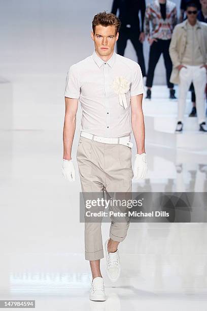Model walks the runway at the Michalsky Style Nite fashion show on July 6, 2012 in Berlin, Germany.