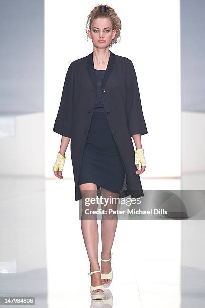 Model walks the runway at the Michalsky Style Nite fashion show on July 6, 2012 in Berlin, Germany.