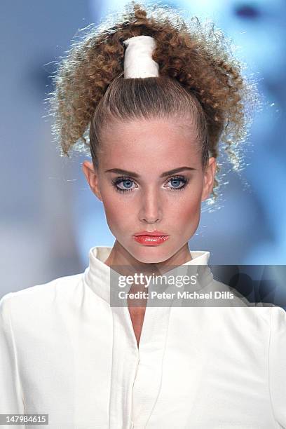 Model walks the runway at the Michalsky Style Nite fashion show on July 6, 2012 in Berlin, Germany.