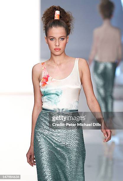 Model walks the runway at the Michalsky Style Nite fashion show on July 6, 2012 in Berlin, Germany.