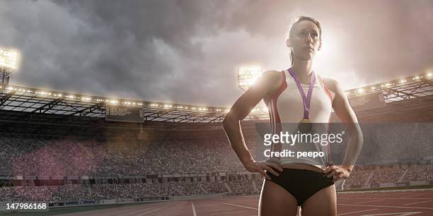 champion athlete gold medal winner - sportsperson medal stock pictures, royalty-free photos & images