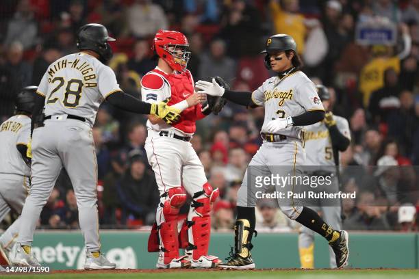 Ji Hwan Bae of the Pittsburgh Pirates celebrates after hitting a home run during the second inning against the Boston Red Sox at Fenway Park on April...